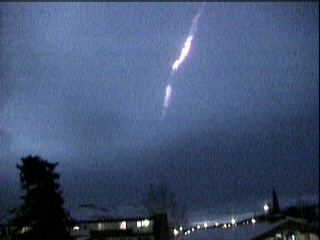 Video still of fireball contrail by WHTV from downtown Whitehorse